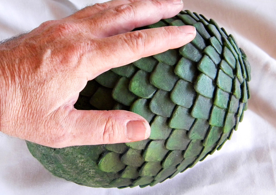 The egg in relation to my hand. The final size is about 6″ x 8.5″.