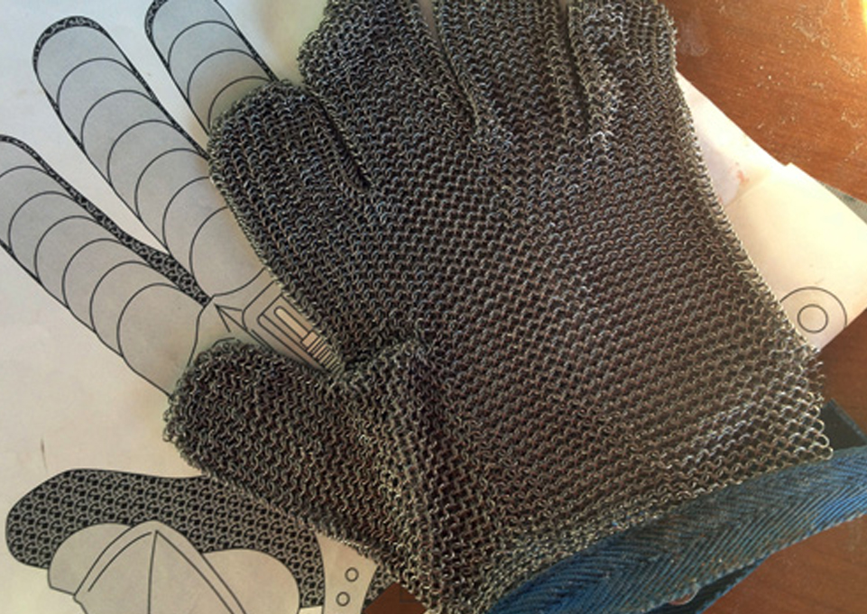  Now it was time to make the gauntlet. I wanted to finish this within my natural lifespan so I bought a meat slicing chain mail glove for the base of the gauntlet. 