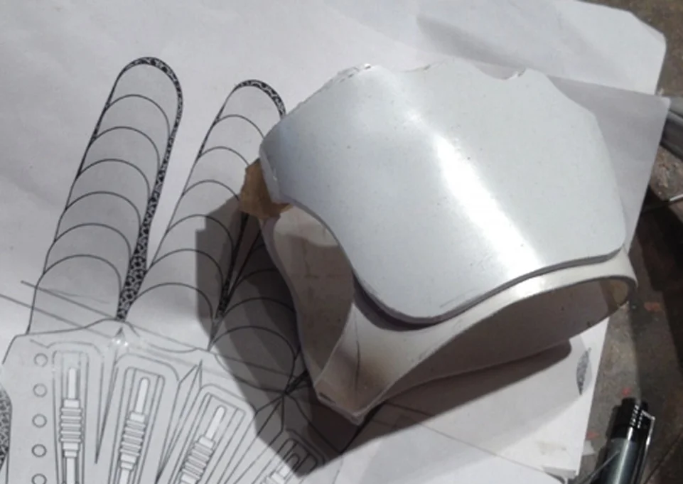 I heated more plastic and made the plate for the back of the hand.
