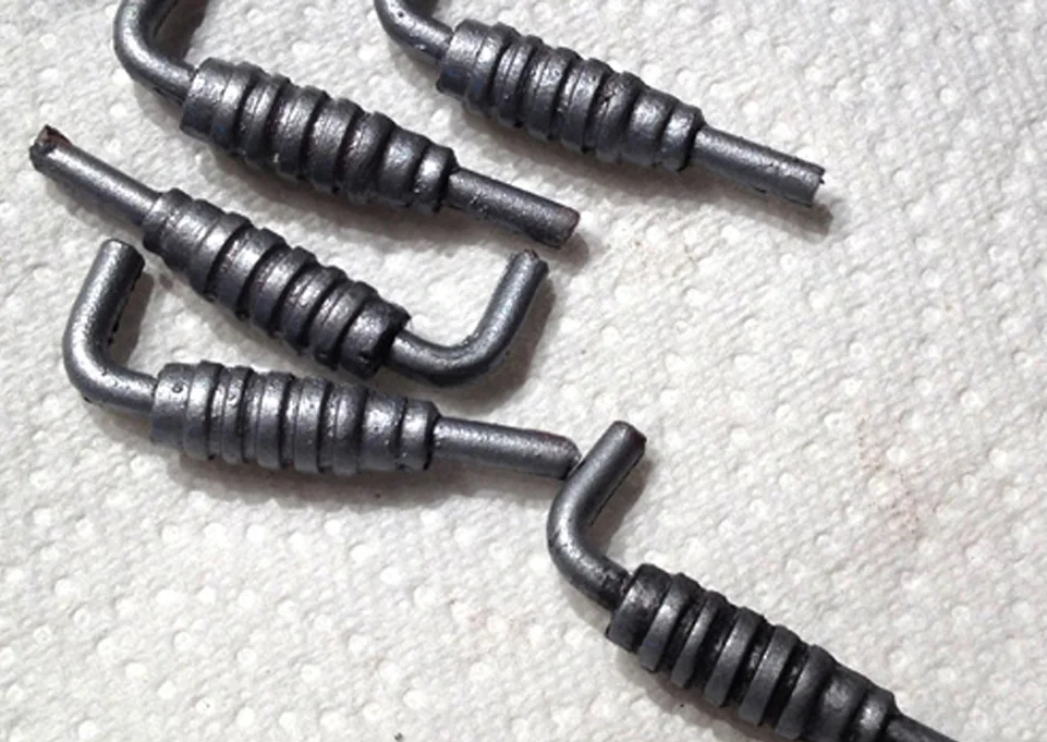 The pistons where painted and given a wash of black acrylic to bring out the detail. Sharp-eyed readers will notice an extra piston. It never hurts to make extra as long as you’re at it. You never know when a knife will slip and screw up a part.