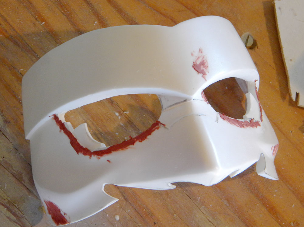  The half mask with excess cut away and the scribed lines filled with putty. 
