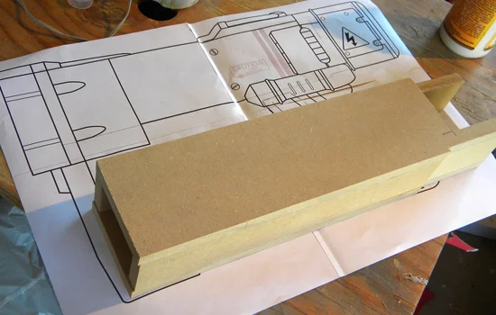 With plans generously furnished by my friend Volpin , I started by making the body of the gun from 1/2” MDF. The edges would be rounded on the router table.