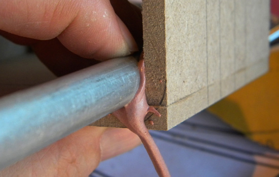  I rounded the inside corners of the cowl by plopping some Bondo inside and rounding the corner to the proper radius with an aluminum tube. 