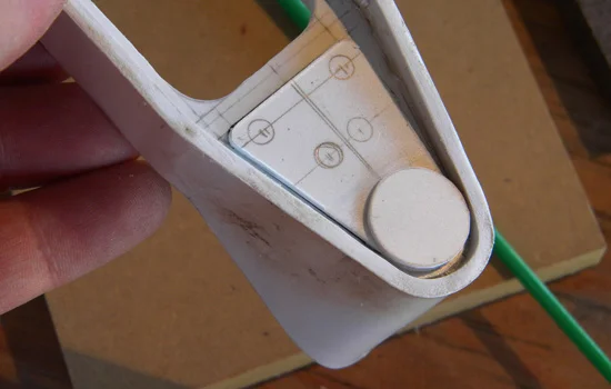 I cut plates of styrene to form the detail on the base of the front plate.