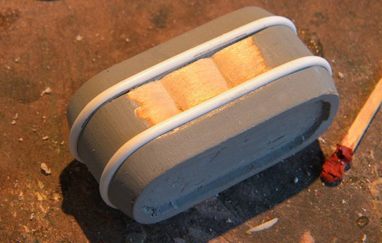  I made a master for the battery with a block of basswood and styrene half round piping. 