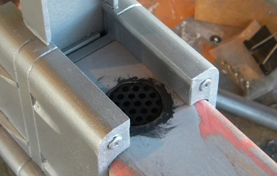 The speaker and grill.