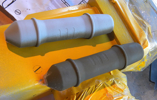  I used masking tape and heavy coats of primer to create inset panels in each side tube. 