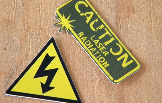 The graphics proved too small for cut vinyl masks so I used laser printed labels.