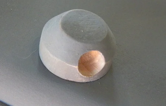 For the cable cap, I glued two disks together and filled the step with Bondo.