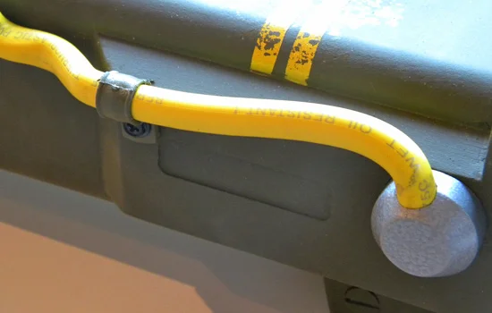 I bought a marine battery cable and attached it to the top of the gun.