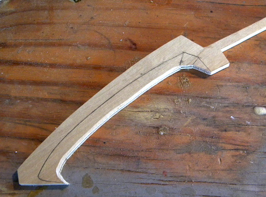  I started with the claws, cutting a master from 1/4″ poplar. 