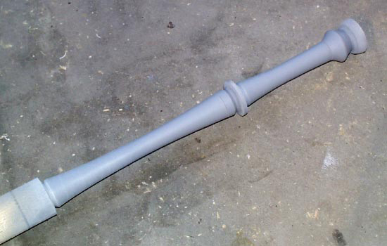 I started by lathing the head and tail shafts out of a single piece of basswood.