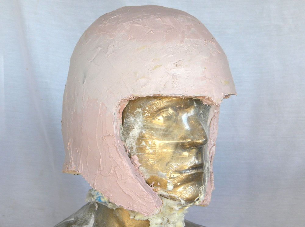  I applied a coat of Bondo over the entire helmet to prep the final surface. 