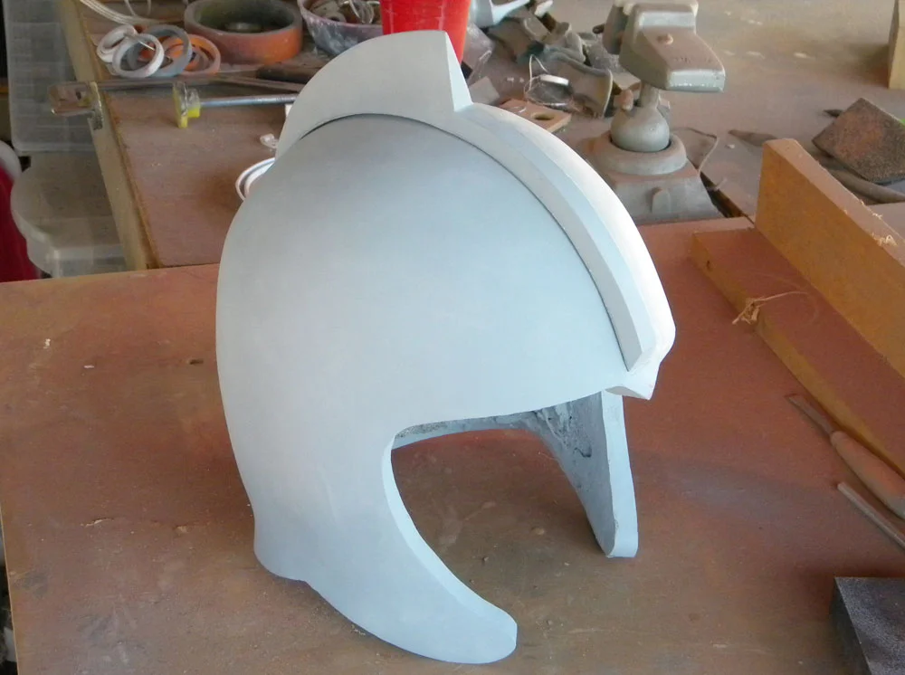 To prevent the crest popping off during construction, I attached it with epoxy and screws from inside the helmet.
