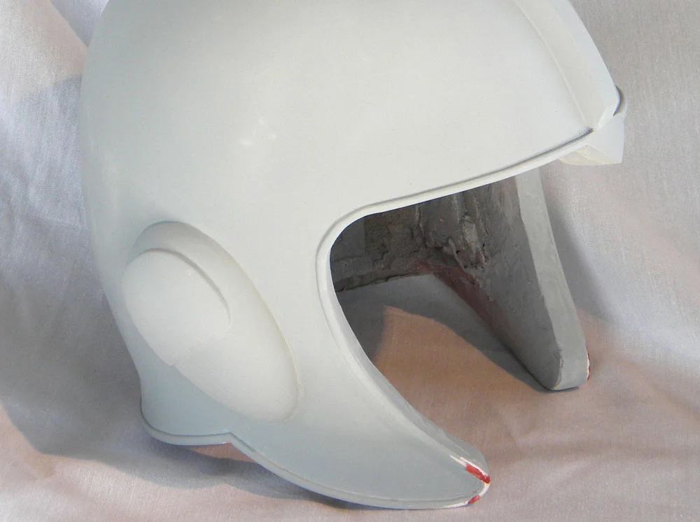 I molded and made resin copies of the ear cups and glued them to each side.