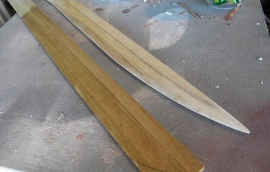 After the edge is cut, I shaped the points and finished the bevel on the belt sander.