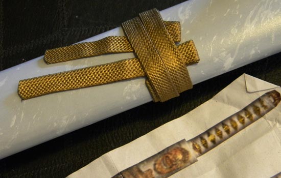  The ribbon applied to Rekki’s scabbard. 