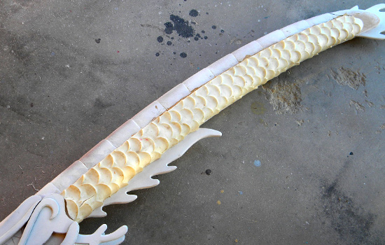I used a heat gun to soften the scale sheet to it would wrap around the dragon’s body.