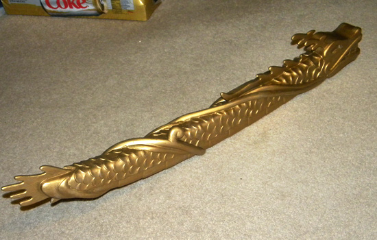  I painted the scabbard with brass paint. 