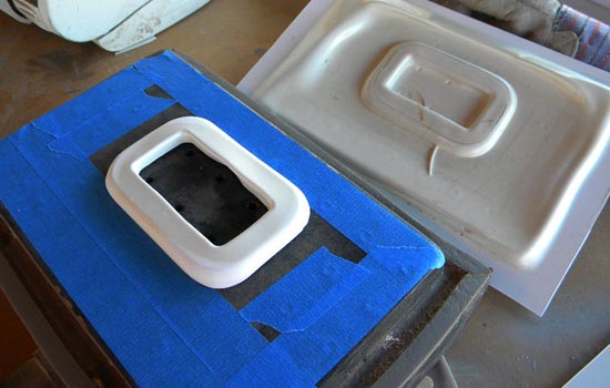 To attach the body to the padding assembly, I used the bracket itself to vacuum form a copy that would fit precisely over the bracket. I had to correct some warping that occurred to the bracket as a result of hot plastic pulled over it but it wasn’t too bad.