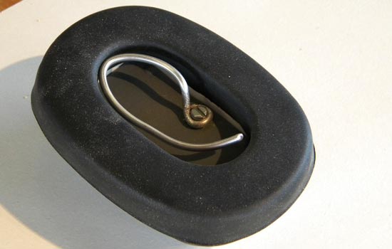 To attach the Scouter to the ear, I screwed an aluminum wire to the bottom of the body where it would stay hidden inside the padding.