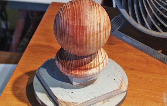  For the mouthpiece of the pipe, I was able to find a wooden finial the right size and checked it to my lathe for modification. 