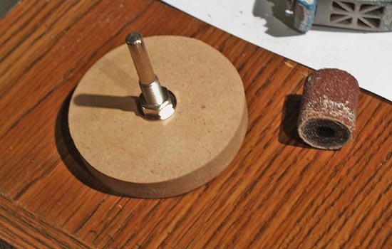 Since the lathe was occupied, I attached a disk of MDF to a drum sander attachment spindle.