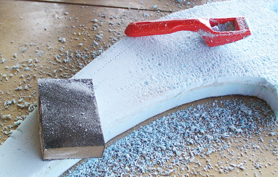 To sculpt the blade I used a small rasp and sanding sponges to smooth the surface.