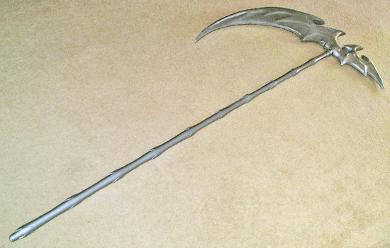 The final painted scythe. Although you can’t see it in the photos, I used hammered finish silver paint to enhance the weapon’s organic qualities.