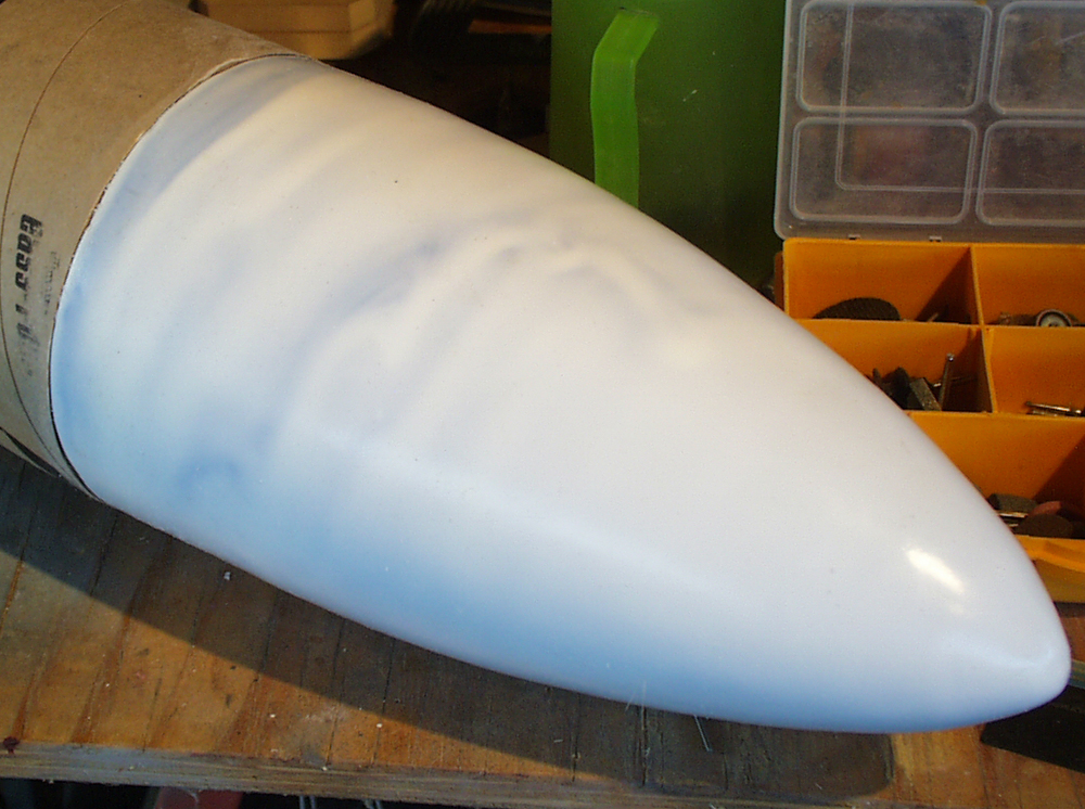  I slush cast a copy using SmoothCast 300 and it fit in the tube perfectly!. The surface looks uneven because dark tinted resin was used behind the thin initial coat. 
