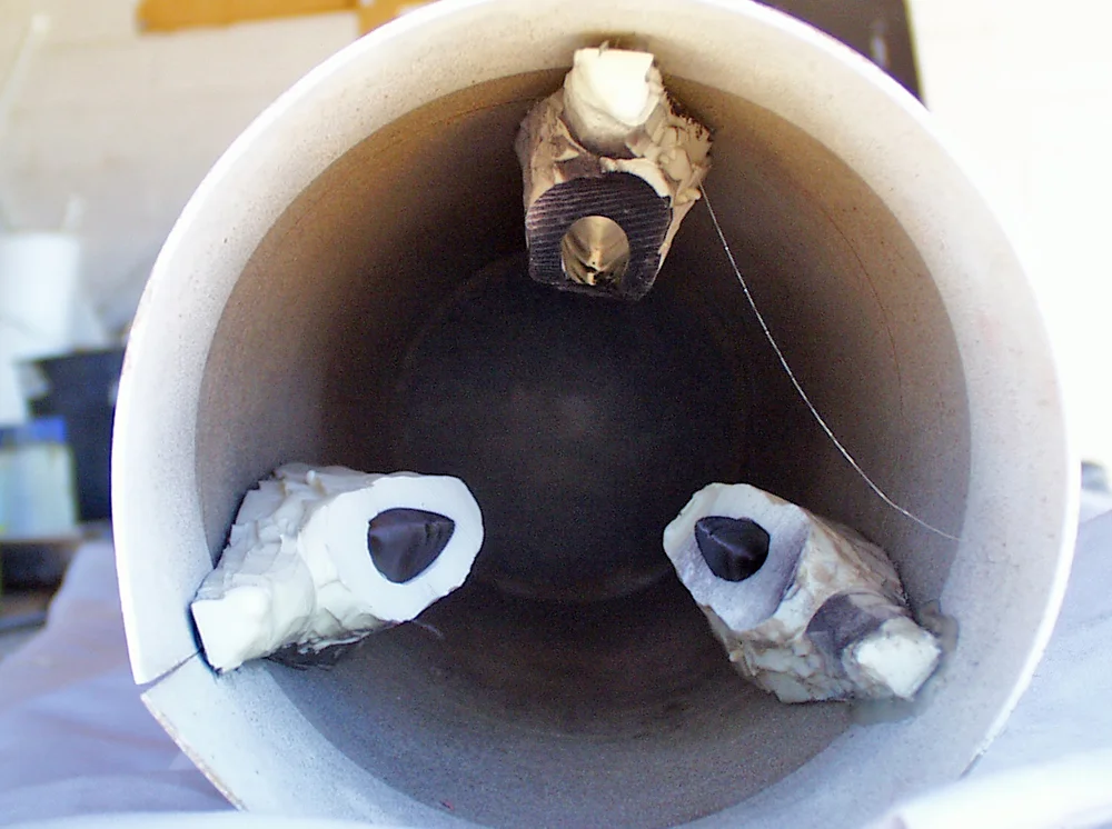 The vents were then hot glued into the tube sections.