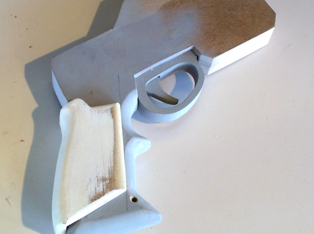 I then routered the edges and sanded the grip to shape.