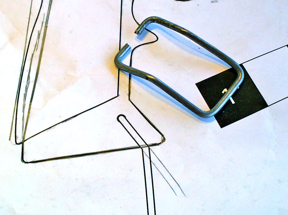  The lanyard loop was made by bending 1/16″ steel wire to shape. 