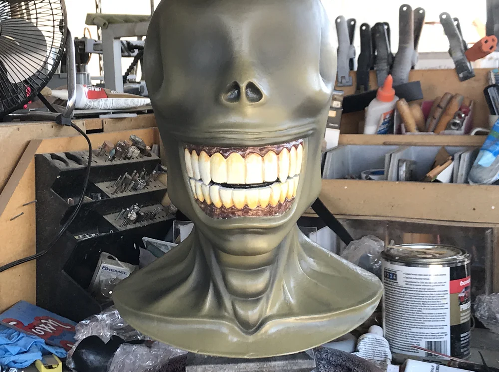 Then it came time to airbrush shadows and definition to the skin. Since I painted the base color from a rattle can, I was concerned with the darker shade matching. I’m horrible at mixing color. I ended up spraying more of the base color into a jar and then adding enough black to darken it slightly.
