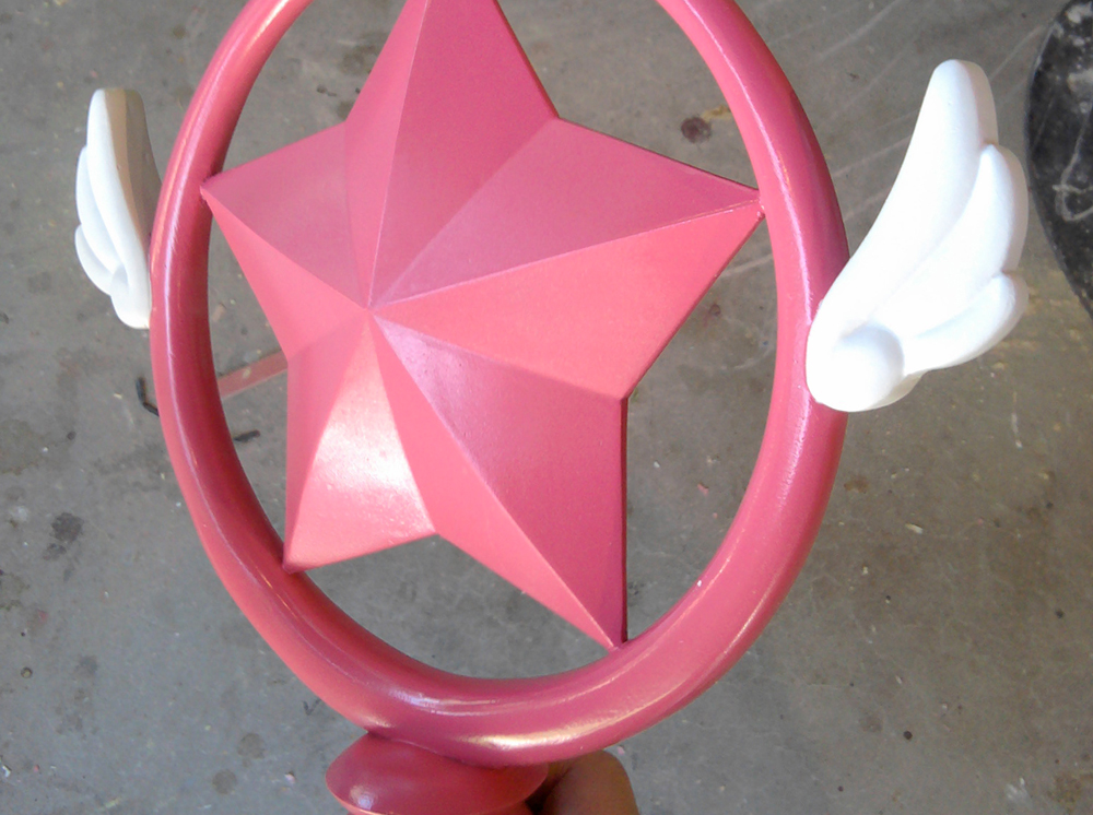 Base coat of pink with white wings painted.