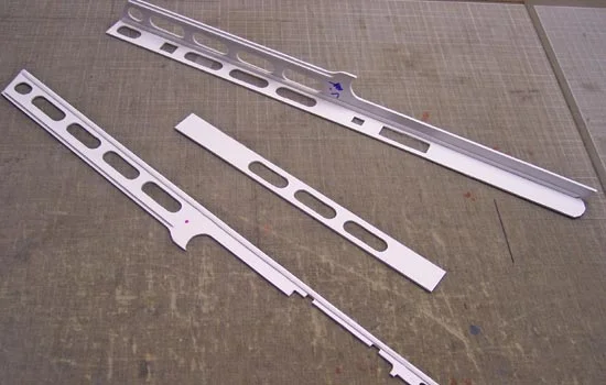 I cut out the sides of the barrel shroud as individual panels and join them together like a box. I glued in a thin strip on the inside joints for support.
