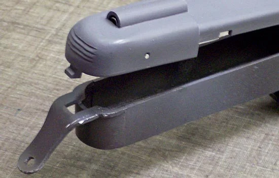 Using a cutaway poster as a guide, I built the trigger assembly internal parts and the rear sight. The rear sight is pretty clever as it uses an inverted “v”-shaped piece of metal as a rocker spring to toggle two different sight apertures. At this p