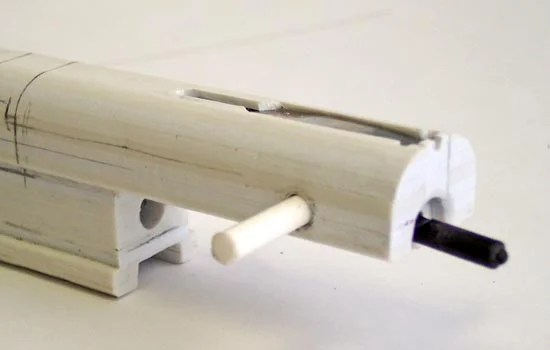 When it’s inserted, another pin locks it in place.