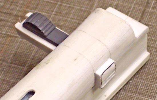 After I marked the positions of the bolt in the receiver, I drilled, filed and cut the hole for the handle.