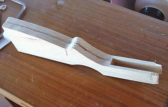Even though I built everything to spec, because of my materials the receiver had to be thicker walled. In other words, the receiver wouldn’t fit! I used some 1/8″ basswood to widen the receiver opening and then laminated all the parts together.