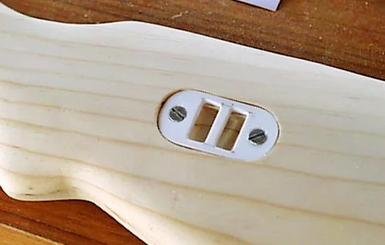 The left side of the stock houses the rear sling bracket. I dremeled out this area to match a styrene bracket I had cut.