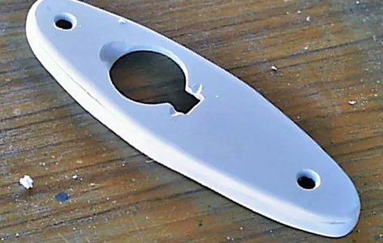 The edges were sanded off and smoothed and the screw holes were beveled.
