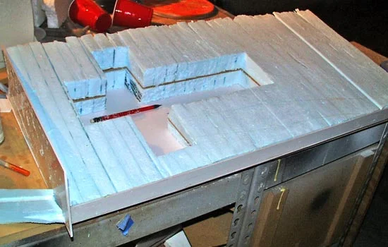 I cut out the hole in the bit, leaving a section at the edge for support.