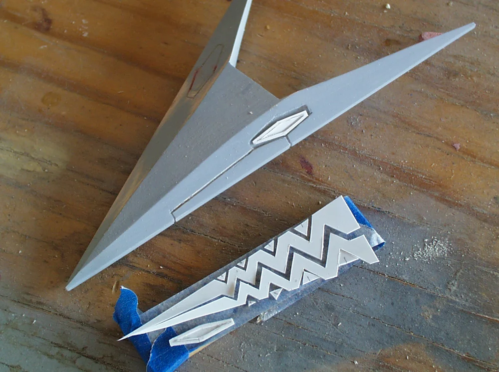 I cut the tail details from thin styrene.