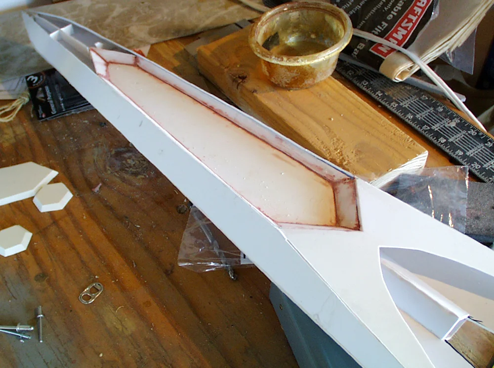I glued styrene side panels to the head.