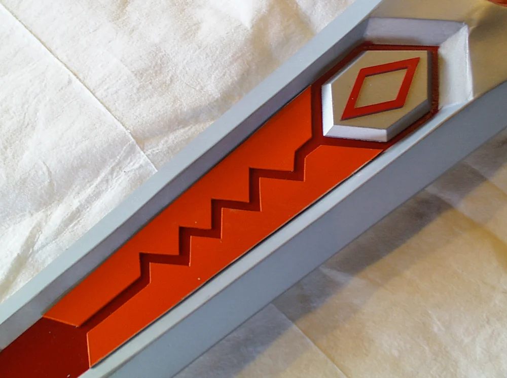 I cut the zig-zag detail from thick styrene and glued them into the recesses.
