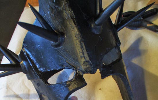 I painted a base coat of black over the entire helm.
