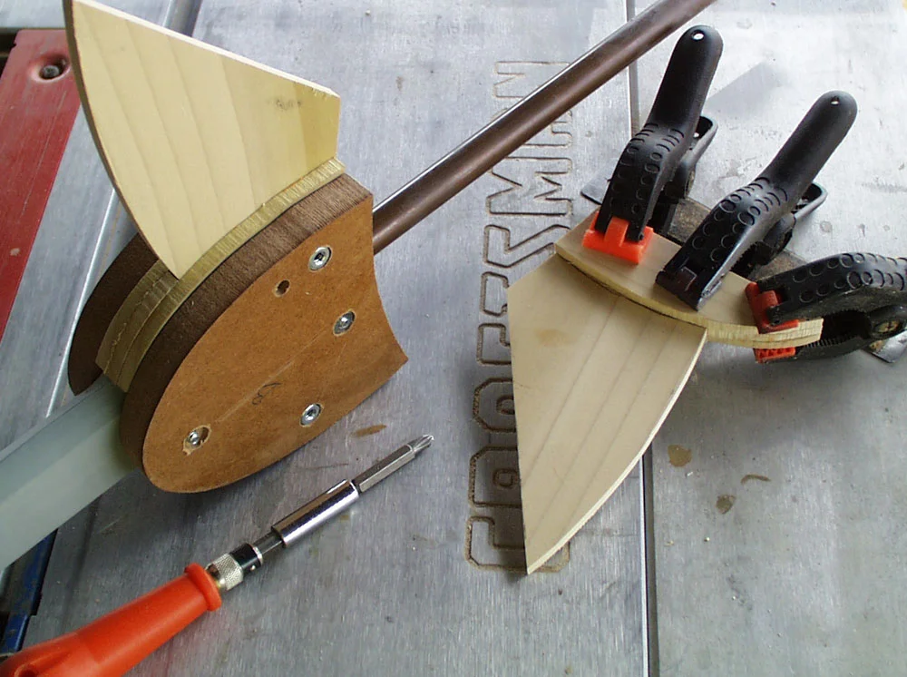 I then cut the wings from 1/4″ poplar and filled the gap between the MDF with more poplar.