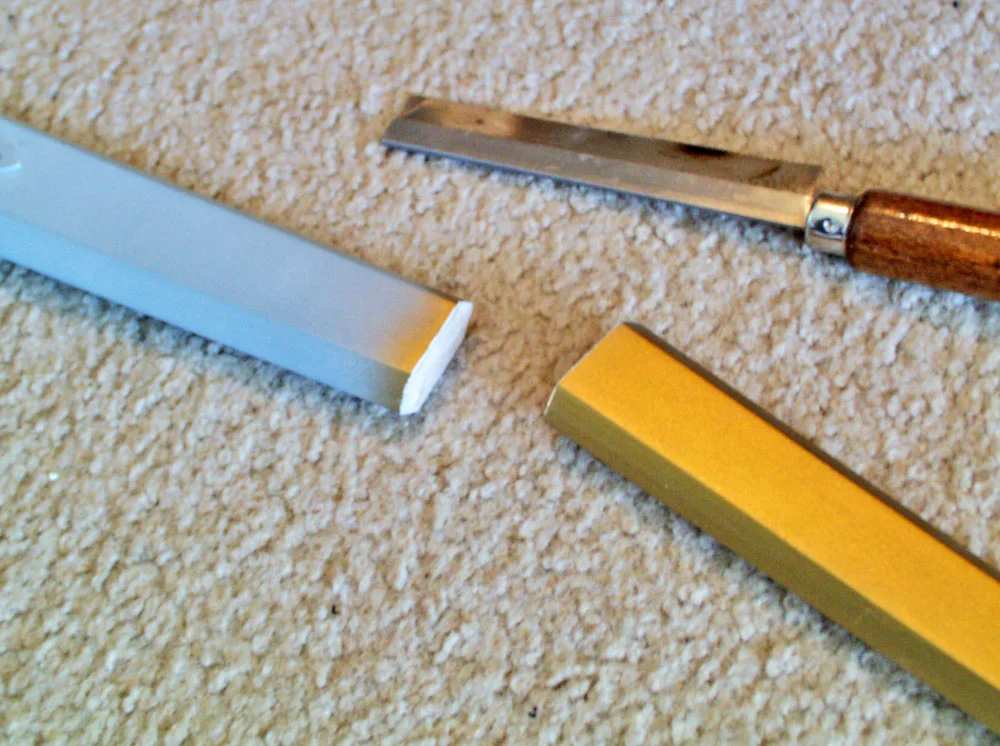 When I got a shipping estimate, I found that the sword was too long to ship cross country for a reasonable price. The only solution was to cut the blade in half so it fit in a smaller package.