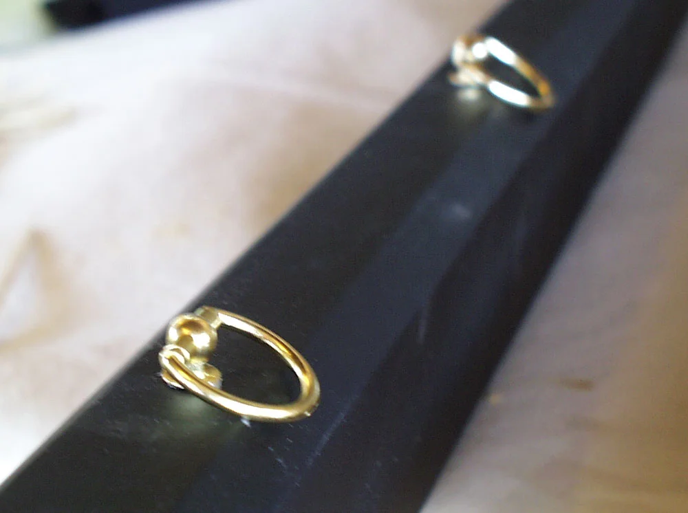 I added two rings to the scabbard so that it could be worn from a belt.